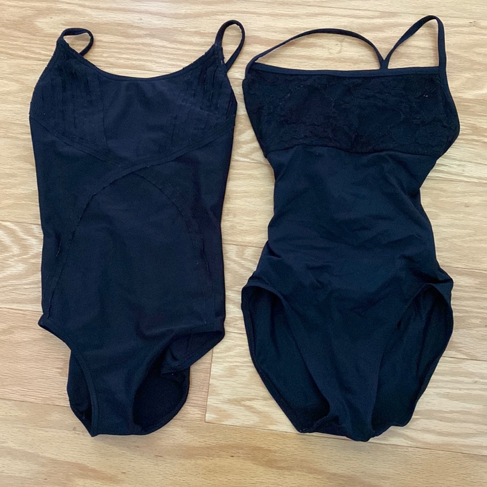Two capezio black leotards with Strappy back size XS.